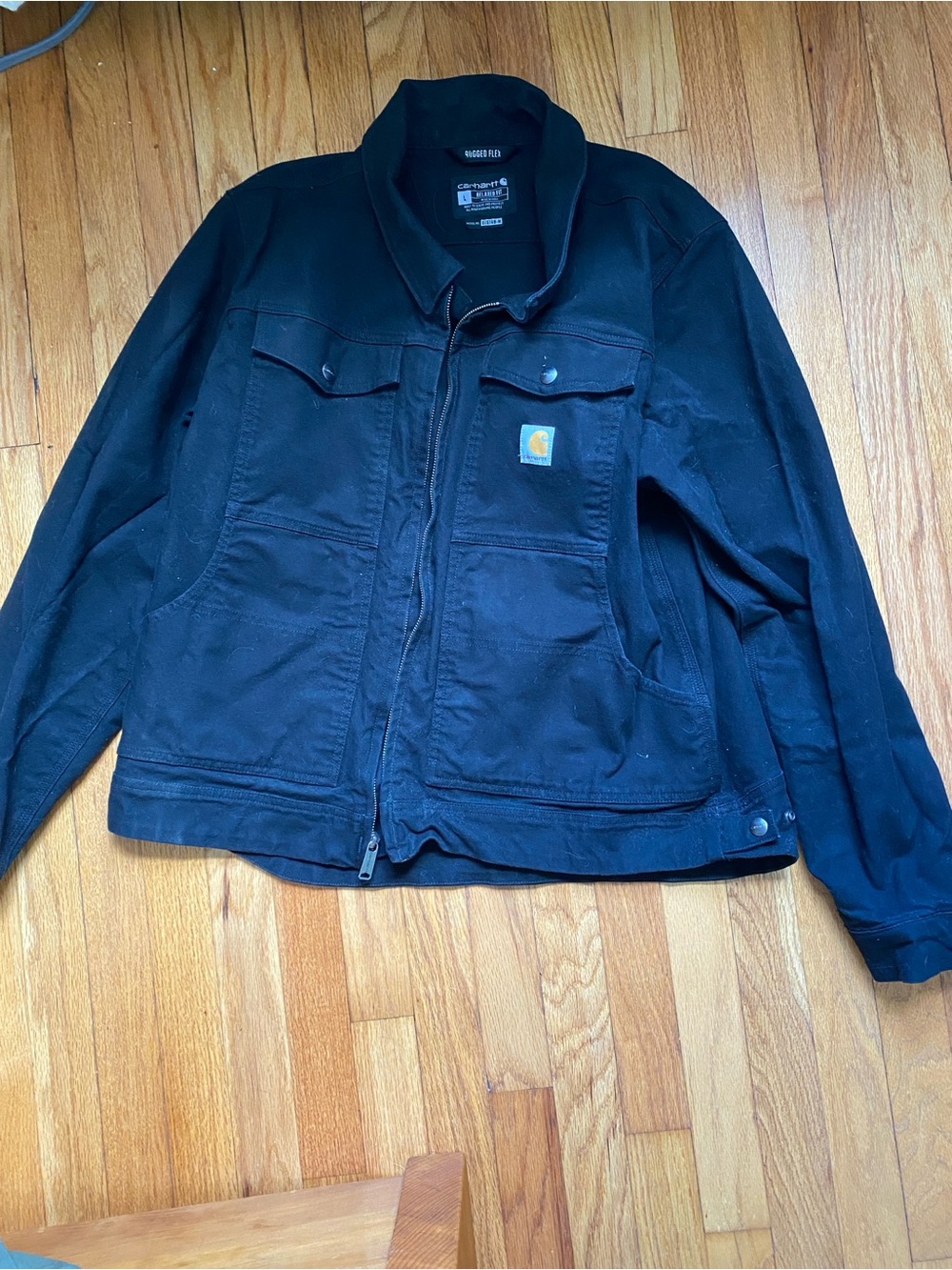 Black Carhartt zip-up jacket